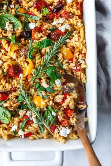 This Baked Feta Pasta recipe is simple and packed with Mediterranean flavor! Perfect for a fast, easy weeknight dinner.
