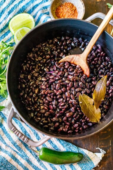 Learn how to cook dry black beans from scratch. This black beans recipe is easy to make and full of flavor, resulting in a creamy interior while holding its structure and shape. A healthy side dish or perfect to use in salads, Buddha bowls, enchiladas, tacos, soups, and more!