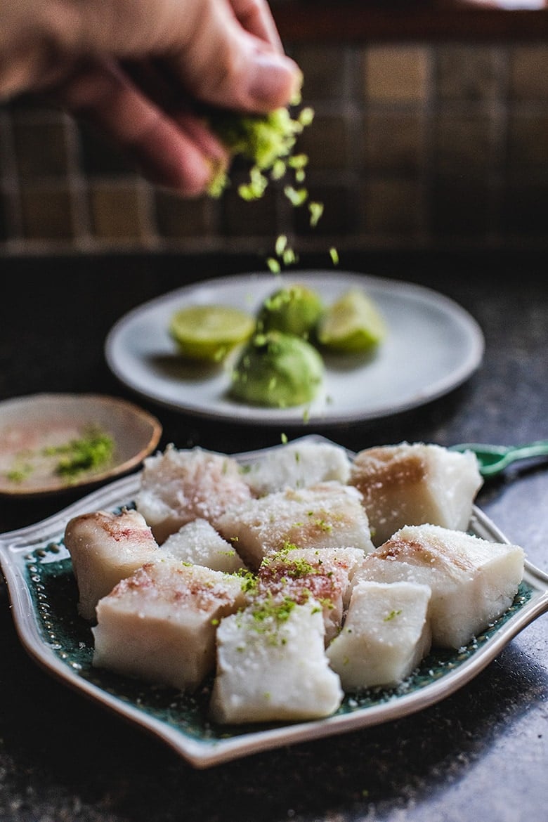 A simple Brazilian Fish Stew called Moqueca made with your choice of fish, simmered in coconut milk with onion, tomatoes, chilies and lime. Easy, fast and full of flavor! Serve this with rice! #Moqueca #fishstew #brazilianfishstew