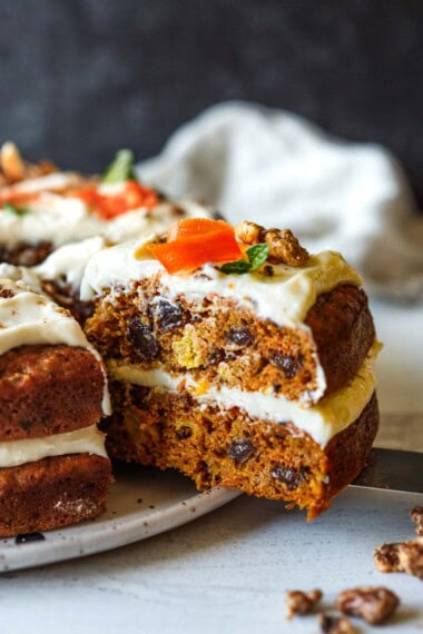 Moist and chock full of carrots, this delightful Carrot Cake recipe with cream cheese frosting offers a lightened-up version that doesn't compromise on flavor.