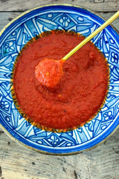 This easy homemade Chili Garlic Sauce recipe is made with dried chilies, garlic, and shallots and can be kept in the refrigerator for months! An Asian-style chili paste to use in dishes you are already making!