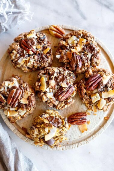 Full of texture and delicious flavor, Cowgirl Cookies are made with coconut, pecans, oats, dark chocolate, cinnamon and ginger. Gluten-free and vegan-adaptable.