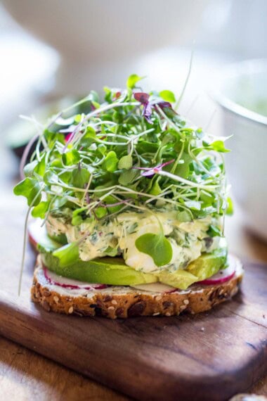 This Avocado Egg Salad recipe is healthy and delicious! Made with creamy yogurt and avocado, and packed with fresh herbs, it's bursting with fresh flavor.