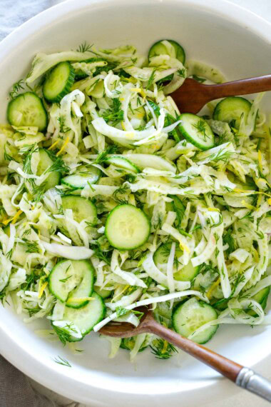 This shaved fennel salad recipe uses thinly sliced fennel bulb, cucumber, and fresh dill tossed in a lemony dressing. Refreshing and light, it is a vegan side dish that can be made ahead and pairs well with many things!