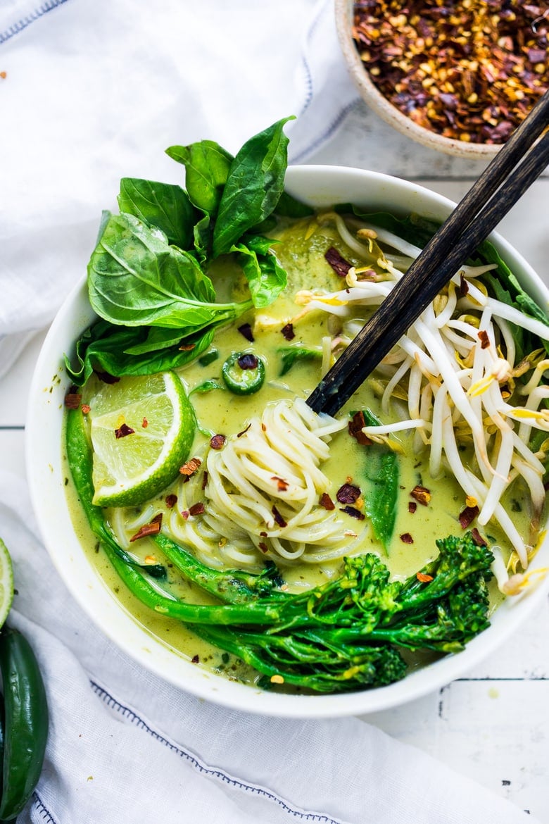 This Green Curry Noodle Soup recipe is bursting with Thai flavor! A fast and flavorful meal loaded up with healthy veggies and your choice of protein: chicken, shrimp or tofu. Make this easier, with store-bought Green Curry paste or try Homemade! Video.