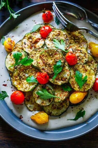 This grilled zucchini recipe is quick and easy and full of Middle Eastern flavor. It's a fantastic side dish you'll want to make all summer long! Vegan and Gluten-Free.