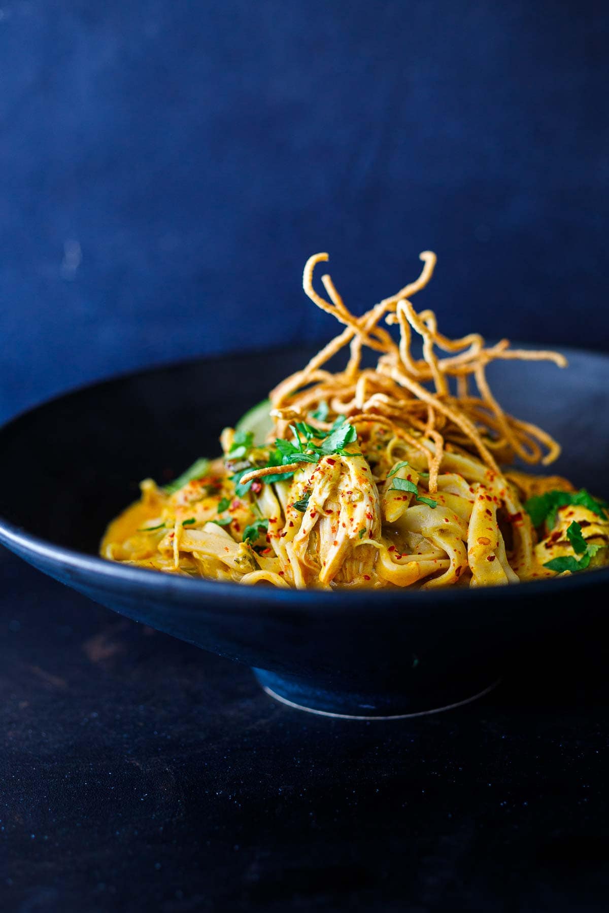 khao soi This Khao Soi recipe is rich, fragrant and delicious! It's a Coconut Curry Noodle Soup that hails from Northern Thailand and can be made with chicken, shrimp, tofu, or our crispy tofu. Vegan-adaptable, GF. Watch the Video!