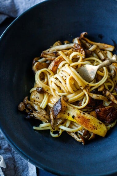 This Miso Pasta recipe is creamy, rich, and full of umami goodness. Topped with sauteed mushrooms, it's an easy weeknight meal in under 30 minutes, Vegan-adaptable and gluten-free- adaptable.