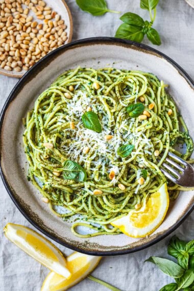This quick pesto pasta recipe is bright, bold, and packed with flavor. Made with fresh ingredients, this delicious weeknight meal is perfect for summer and ready in just 30 minutes! Vegan-adaptable and gluten-free adaptable.