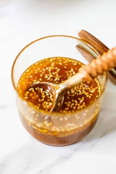 Tangy, sweet, and flavorful, this sesame ginger dressing is delicious on slaws and salads. Easy to make with simple pantry ingredients, it's vegan, healthy and gluten-free!