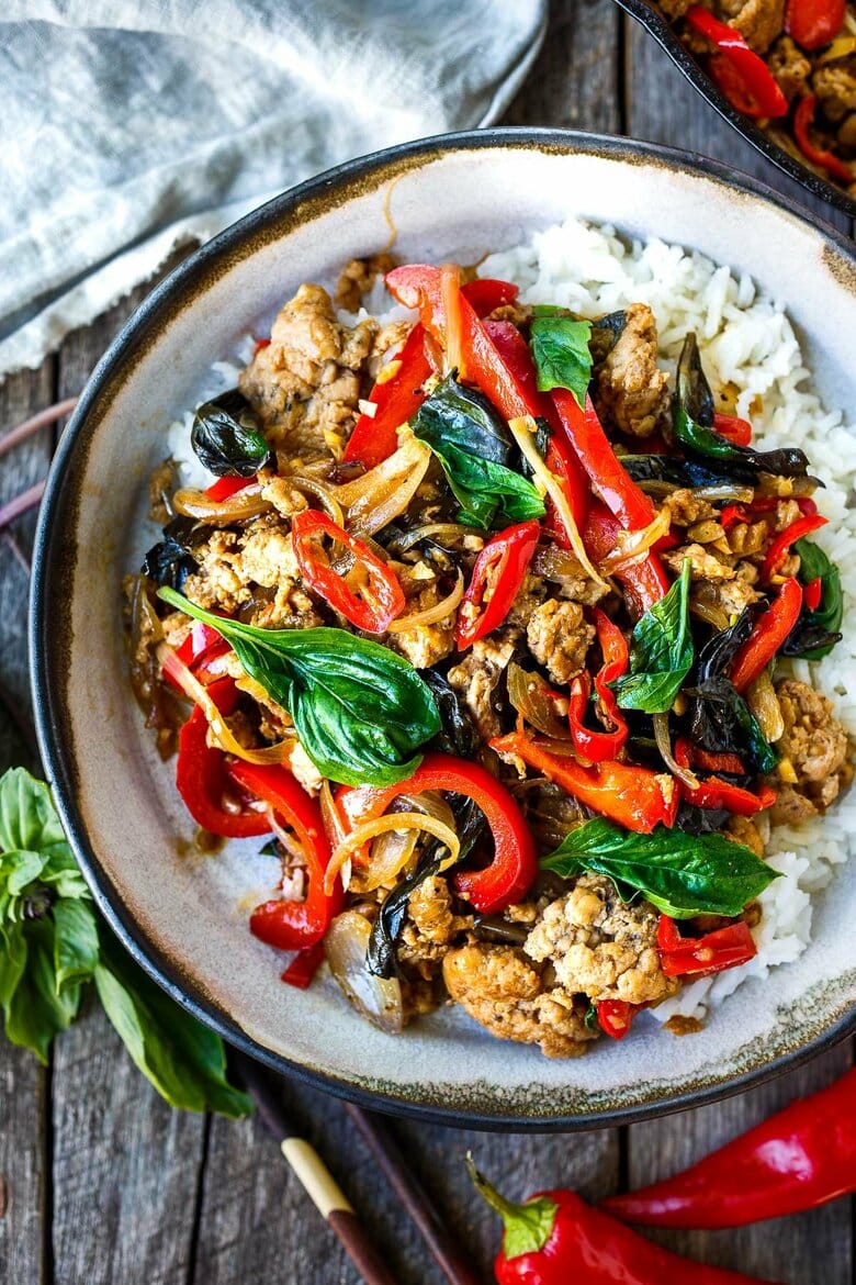 Thai Basil Chicken is simple, fast and flavorful! Made with ground chicken (or ground turkey) it's ready to serve in under 30 minutes.