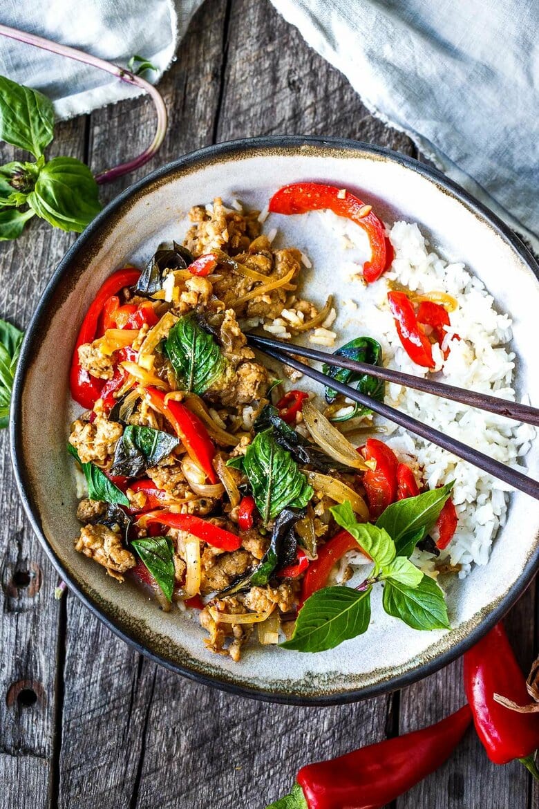 Thai Basil Chicken is simple, fast and flavorful! Made with ground chicken (or ground turkey) it's ready to serve in under 30 minutes.