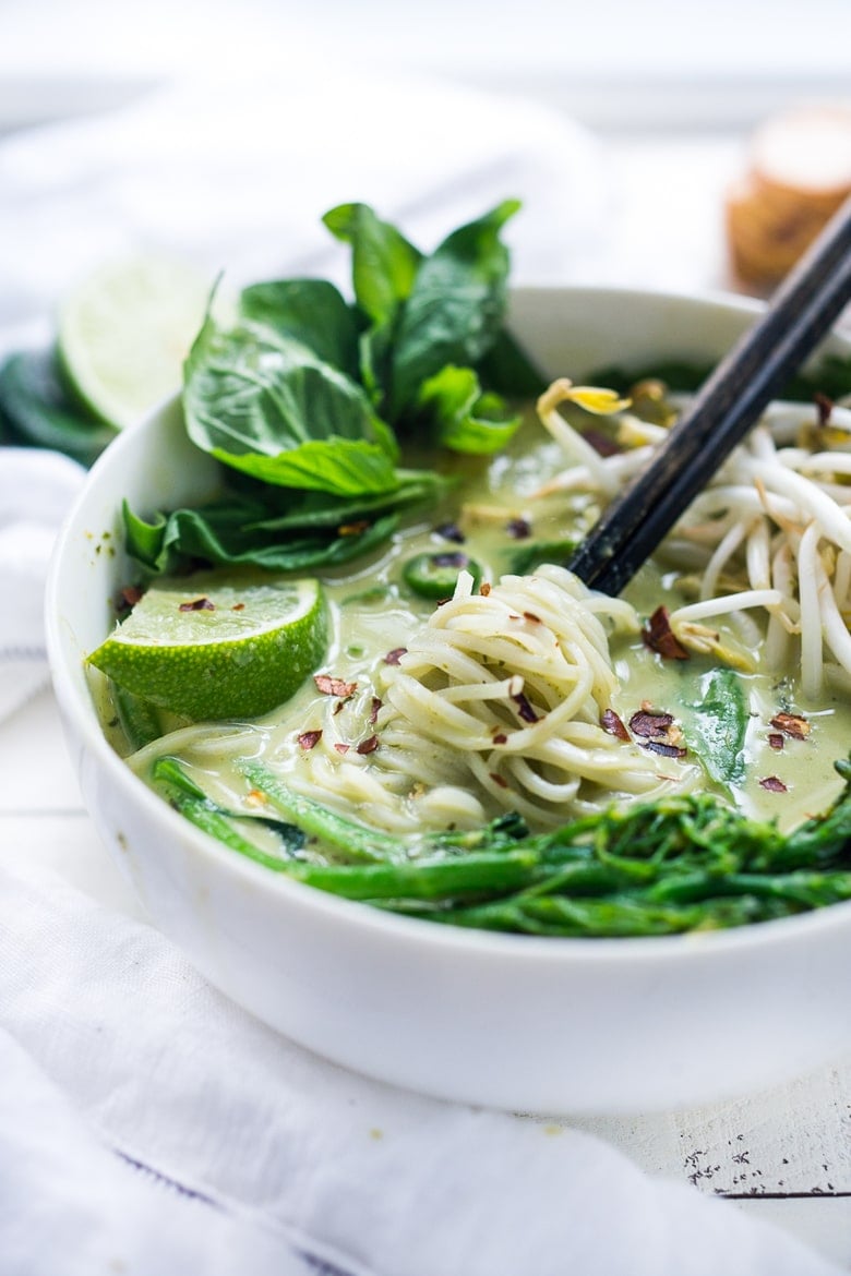 Bone-warming, Thai Green Curry Noodle Soup - with broccolini and and your choice of tofu or chicken. | www.feastingathome.com