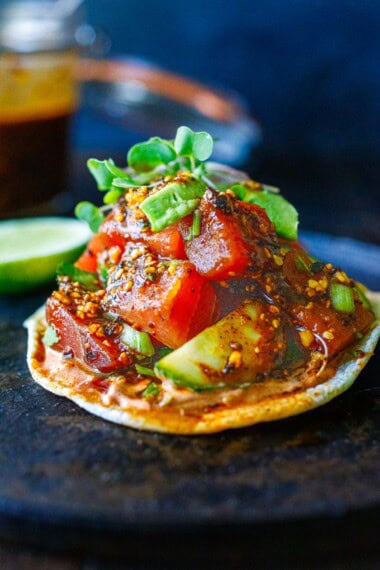 These ahi tuna tostadas are bursting with Mexican flavor! Easy to make in 30 minutes, they make a great appetizer or light meal. Gluten-free.