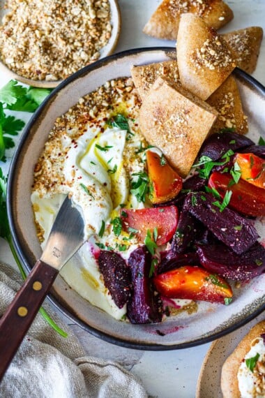 This lusciously creamy whipped feta dip comes together in 10 minutes with just 4 ingredients! A crowd-pleasing appetizer everyone will love!